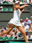 Maria-Sharapova-Sexy-Legs-Playing-at-Wimbledon-2014-0-435x580.jpg