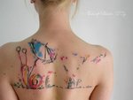 Gorgeous-watercolor-snail-tattoo.jpg